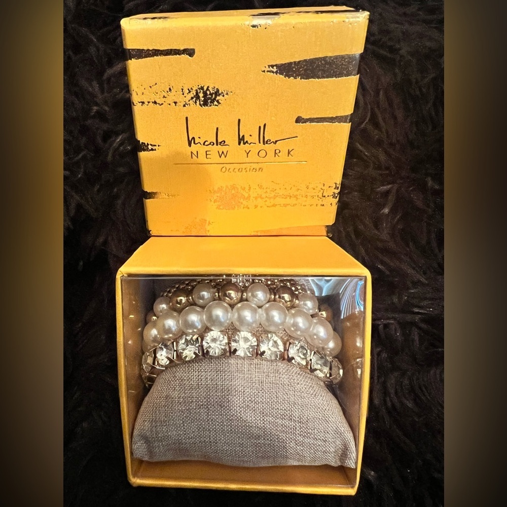 New in Box sealed Nicole Miller New York Four bracelet set